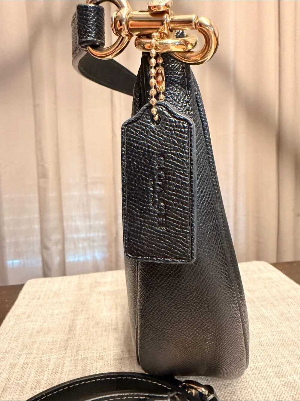 Coach sleek black